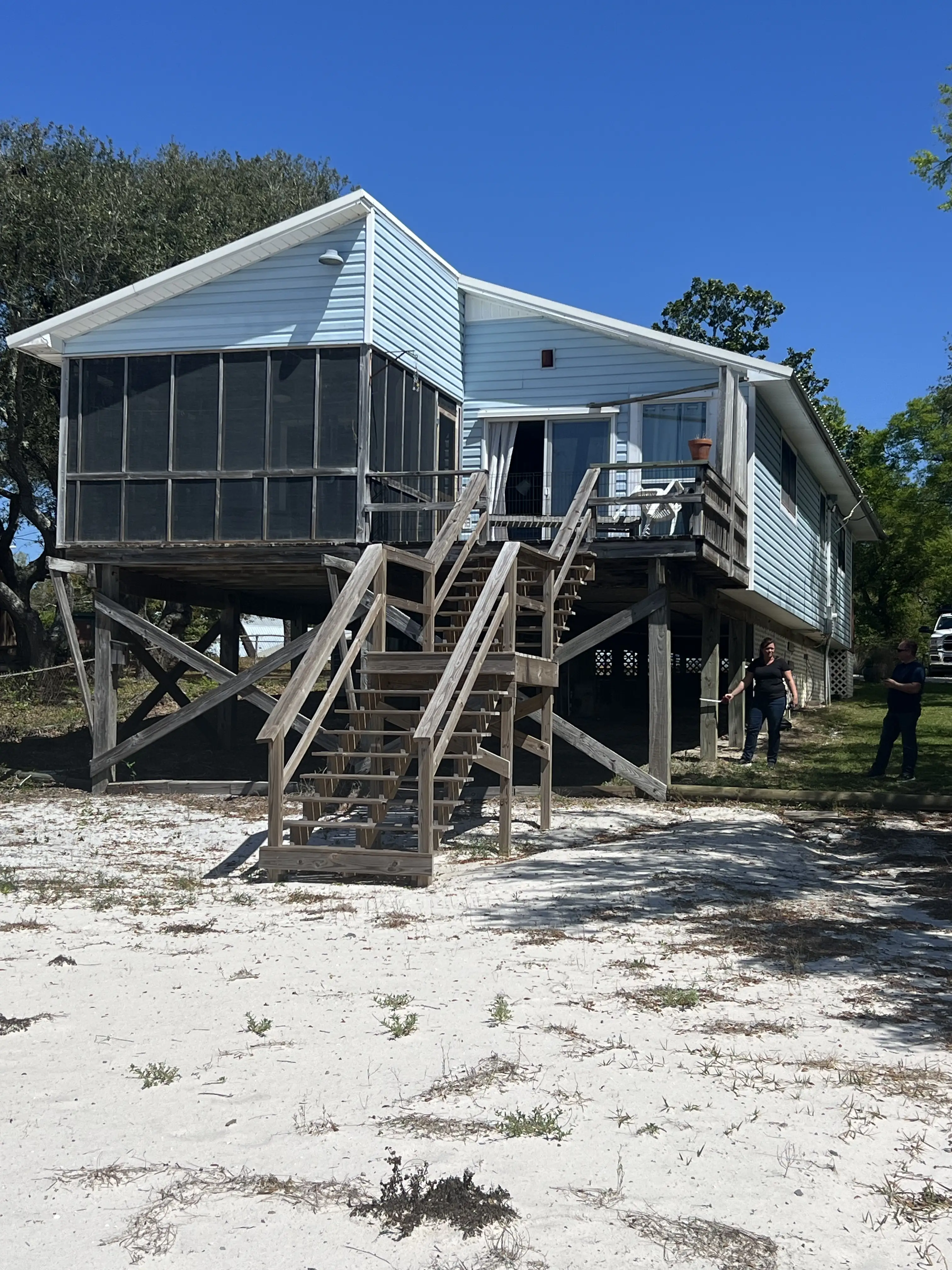 Existing Home - Street view of the original Bayshore home before redesign.